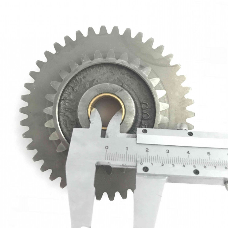 Блок шестерен Урал заднего хода