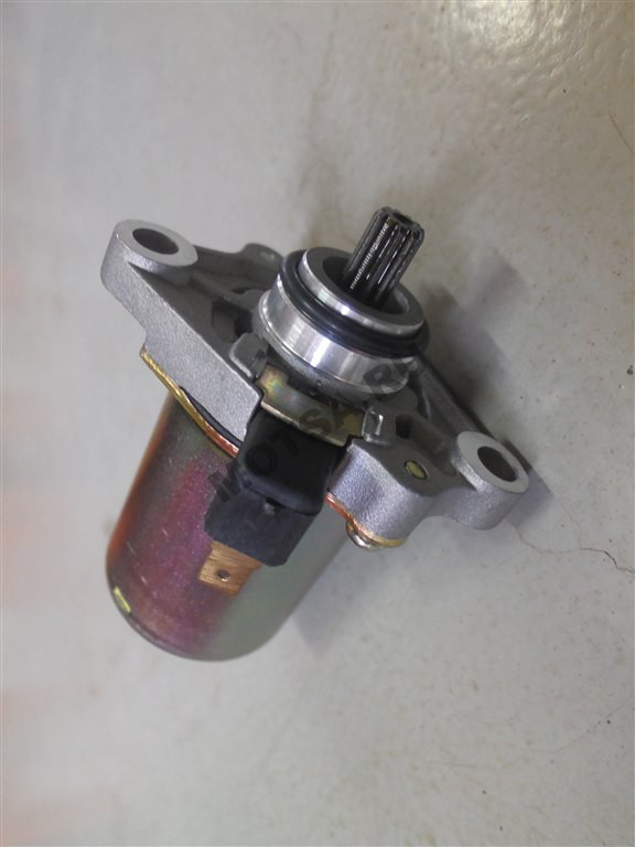 Электростартер Honda Tact 50 (AF16) (вал 11 шлицев,d8 мм,вылет 11 мм;клемма плоская назад)